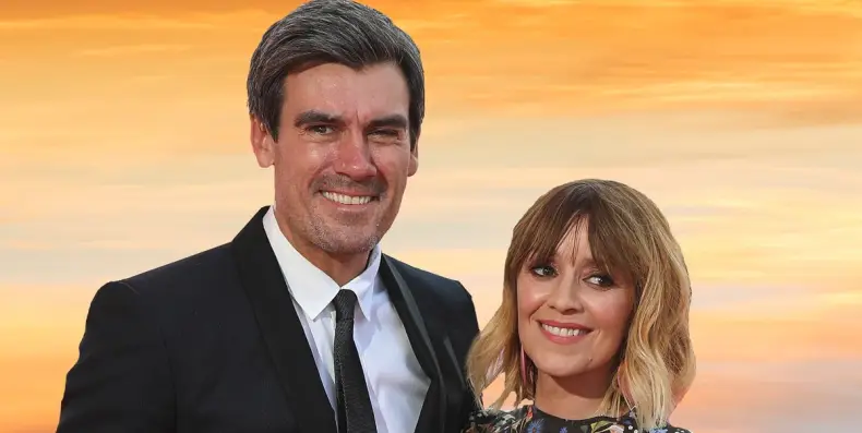 Emmerdale’s Zoe Henry, who plays Rhona Goskirk and is also the partner of Jeff Hordley (Cain Dingle), shocks fans by revealing why both she and her husband are leaving the long-running series at the same time: “We’re standing together to treat his illness—Jeff’s condition can’t wait any longer…”